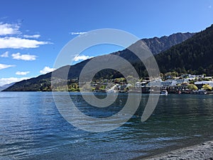 Queenstown Waterfront turquoise crystal clear water on sunny day