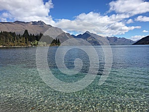 Queenstown Waterfront turquoise crystal clear water on sunny day