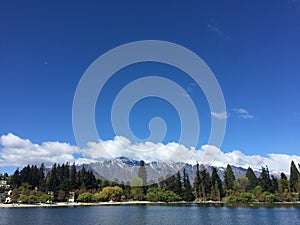 Queenstown Waterfront turquoise crystal clear water on sunny day