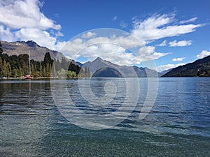 Queenstown Waterfront turquoise crystal clear water on sunny day