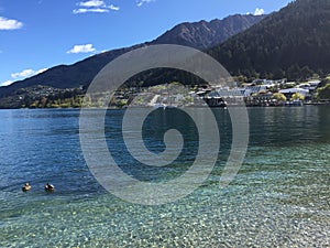 Queenstown Waterfront turquoise crystal clear water on sunny day