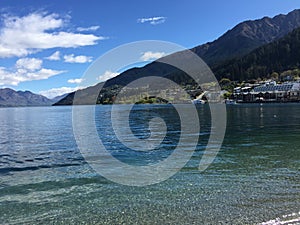 Queenstown Waterfront turquoise crystal clear water on sunny day