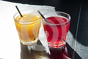 Quenching thirst and refreshing drinks. Cold compotes in glass. Summer fruit drinks. Morse. Compote. Lemonade.