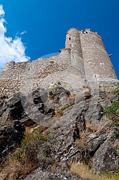 Quertinheux tower and stone mountain sight from bottom at Lastours