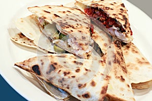 Quesadillas on a white plate
