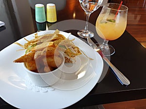 quesadillia with a cocktail at the Raddison hotel