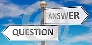 Question and answer as different choices in life - pictured as words Question, answer on road signs pointing at opposite ways to