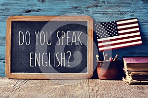 Question do you speak English? in a chalkboard