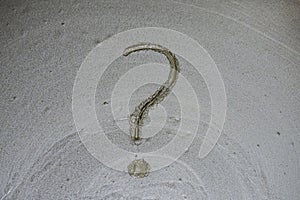 Question mark on concrete