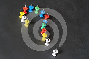 Question mark from push pins. The concept of an unpleasant question