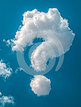 Question mark shaped cloud in a blue sky
