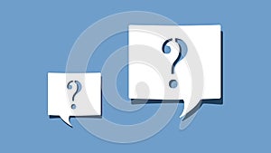 Question mark symbol on cutout white paper speech bubble on blue background