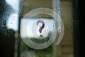 Question Mark Symbol On Misty Mirror With Water Droplets