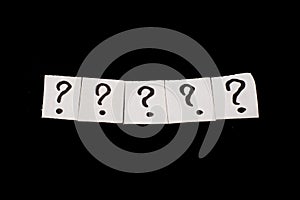 A question mark on a white sheet . FAQ frequency asked questions, Answer, Information, Communication and Brainstorming Concepts