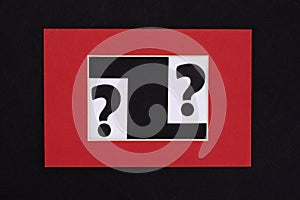 A question mark on a white sheet in the frame . FAQ frequency asked questions, Answer, Information and Brainstorming Concepts