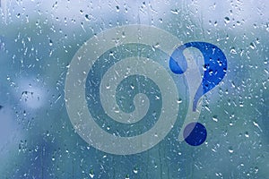 Question mark on a window