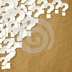 Question Marks white in the corner on a crumpled paper brown background