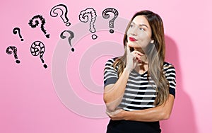 Question Marks with young woman