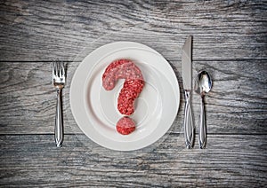 A question of meat, ground beef as a question mark.