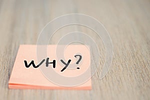 Question WHY on pink sticky note