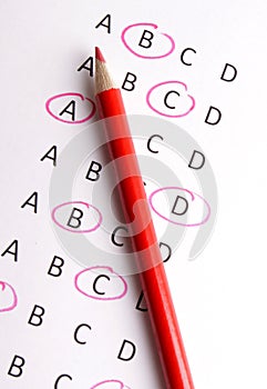 Questionaire with red pencil