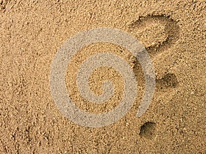 Questionmark in the sand