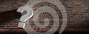 Questionmark on wooden floor and vintage brickwall background. 3d illustration