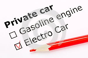 Questionnaire. White paper sheet with checkboxes and red pencil. Survey asks the persons about private car engine: gasoline or ele