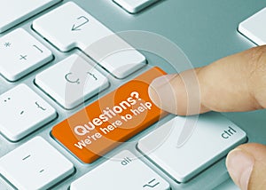 Questions? We`re here to help - Inscription on Orange Keyboard Key