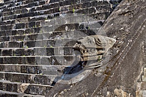 Quetzalcoatl, deity of Mesoamerican culture. Pyramid at Teotihuacan Ruins. Feathered Serpent