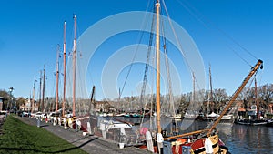 A queue of moored sailing ships in the port of Enkhuizen