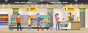 A queue of people with groceries in a supermarket. Grocery shop interior design