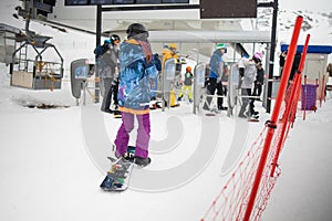Queue at the ski lift. Winter sport.