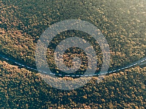 The queue of trucks standing on the road. Top view of the trucks.
