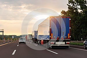 Queue of Trucks on Ukraine-Poland Border traffic jam at Sunset During Protest Roadblock. Business agricultural Logistics