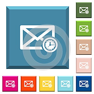 Queued mail white icons on edged square buttons photo