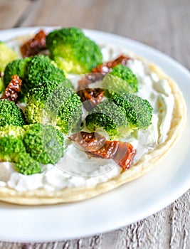 Quiche with broccoli and sun dried tomatoes