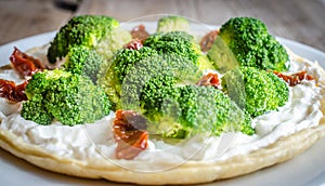 Quiche with broccoli and sun dried tomatoes