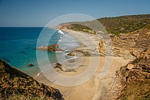 Quiet beach of Zipolite village in maxican region of Oaxaca photo