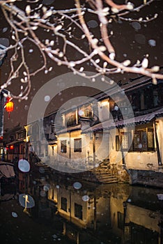 Quiet China ancient water town village in snow dark, zhouzhuang, suzhou