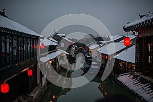 Quiet China ancient water town village in snow dark, zhouzhuang, suzhou