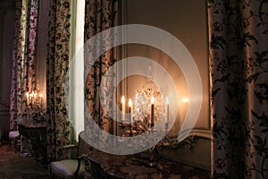 Quiet corner of room with drapes and priceless furniture, The Louvre,Paris,France,2016