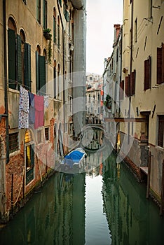 Quiet empty canal without tourists, lifestyle in Venice, Italy