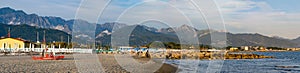 Quiet evening on the beach at Marinella, Massa Carrara, Italy. The Lifeguard station is deserted. The Apuan Alps can be