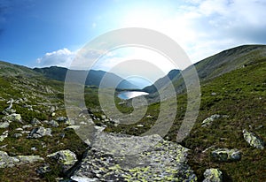 Quiet lake on the peak of mountains