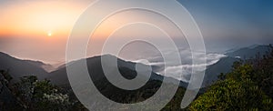 Quiet and peaceful sunset in the mist above the clouds from the top of Eagle Mountain, Yuan Zui Shan, in Taiwan