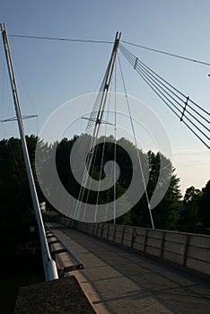 A quiet pedestrian bridge in Helsinki at sunset - 1