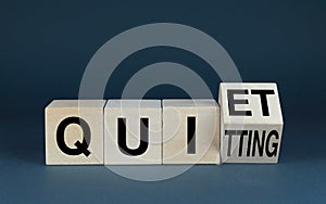 Quiet Quitting. Cubes form the word Quiet Quitting. Extensive Business Concept Quiet Quitting related to work