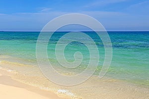 A quiet tropical beach for the perfect romantic vacation . Great for backgrounds and wallpapers