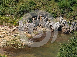 Quiet and uncrowded shore of a rocky cove